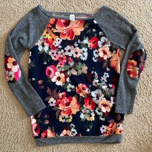 M Floral navy blue and pink, red shirt.  It’s thin sweatshirt type material.